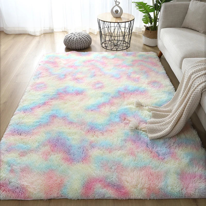 Multicolored fluffy rug in a living room setting with a sofa and small table.