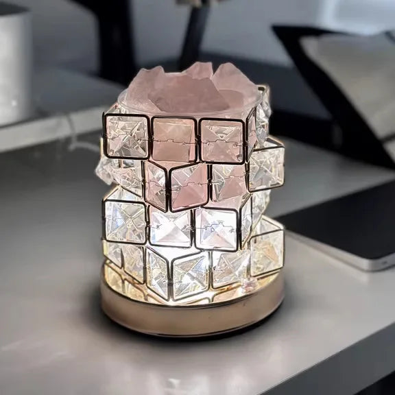 Decorative lamp with crystal-like cube design on a surface