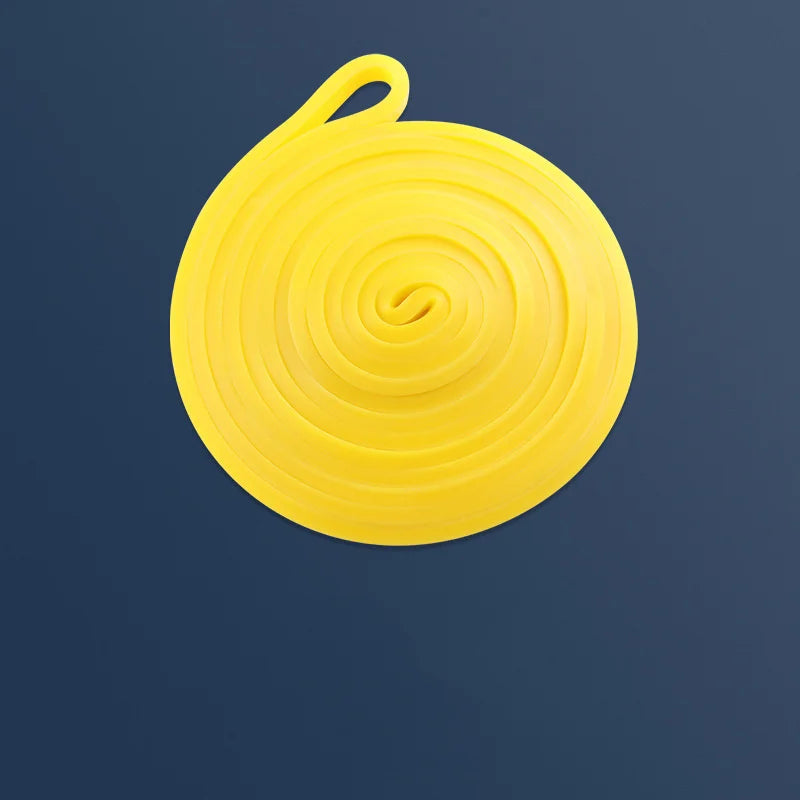 Yellow silicone trivet on a dark blue background