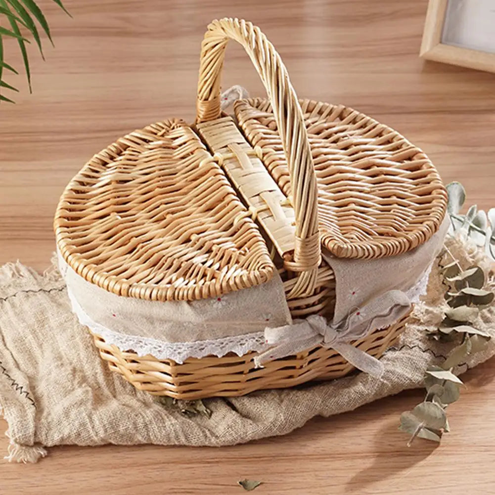 Wicker picnic basket with a lid on a wooden surface